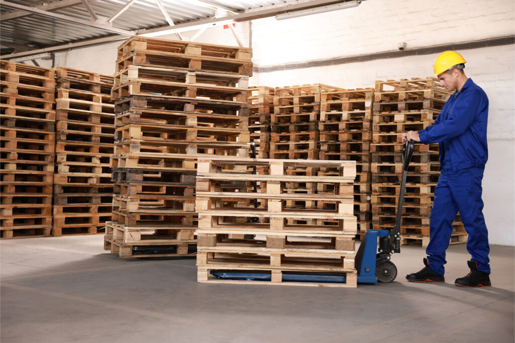 a warehouse worker who has learnt how to stack pallets safely